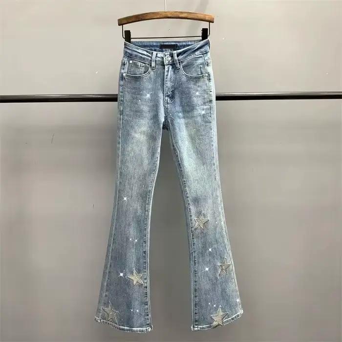 Nouveau jean en denim micro-déchiré brodé pentagramme pour femme, coupe slim, taille haute élastique, collection été 2026 pour occasions variées