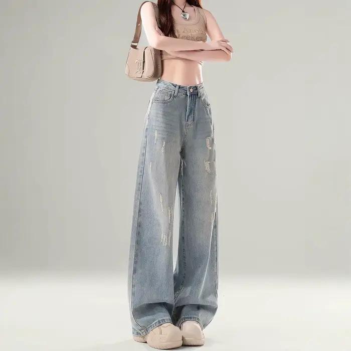 Jean large délavé et vieilli pour femme
